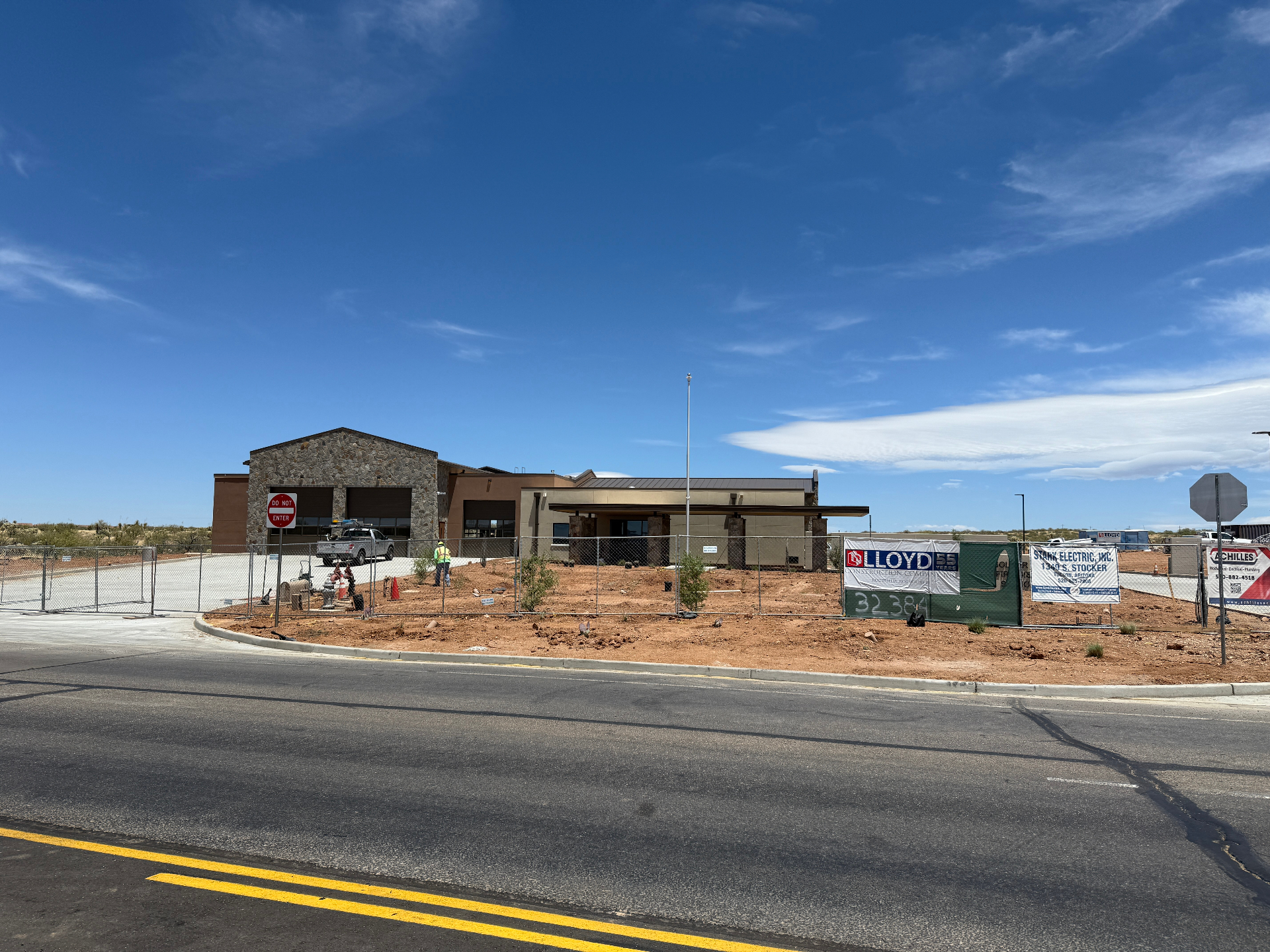 Newly completed Arizona fire station still behind construction fencing